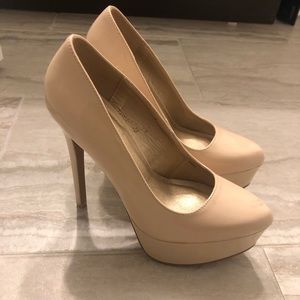 Nude patent heels